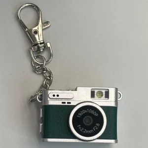 green mini camera on keychain
