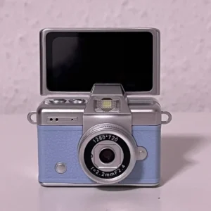 Flip Camera Mini wearable keychain necklace accessory with flippable screen for selfies - portable compact camera blue